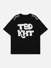 T-Shirt mit beflocktem, besticktem Buchstaben